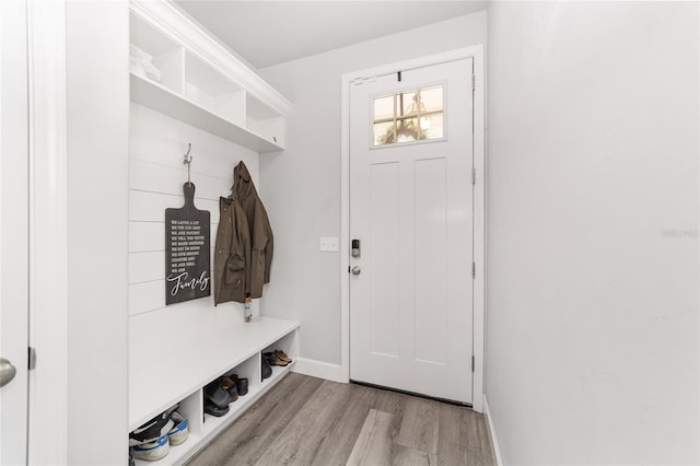 mudroom with light hardwood / wood-style floors