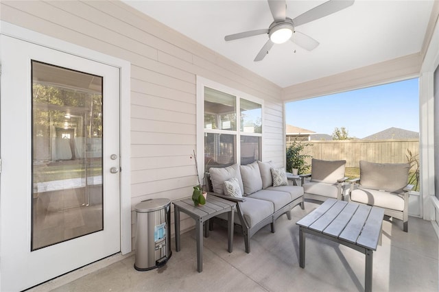 sunroom / solarium with ceiling fan