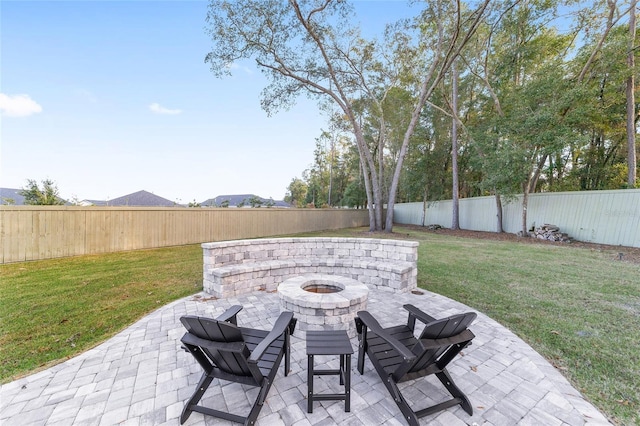 view of patio / terrace featuring a fire pit