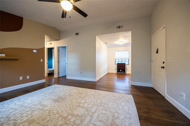 empty room featuring dark hardwood / wood-style floors and ceiling fan