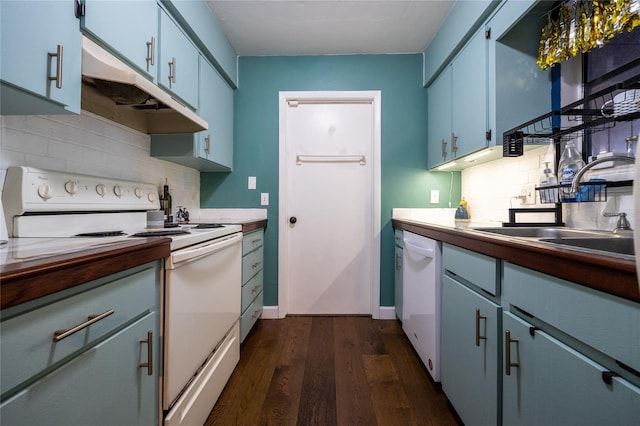 kitchen with white appliances, blue cabinets, sink, dark hardwood / wood-style floors, and tasteful backsplash