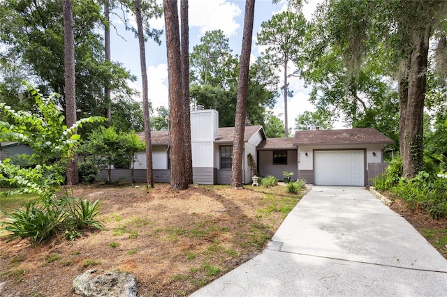2116 SW 73rd St, Gainesville, FL 32607 - view of front of property with driveway and an attached garage