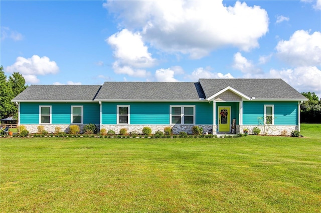 ranch-style home with a front yard