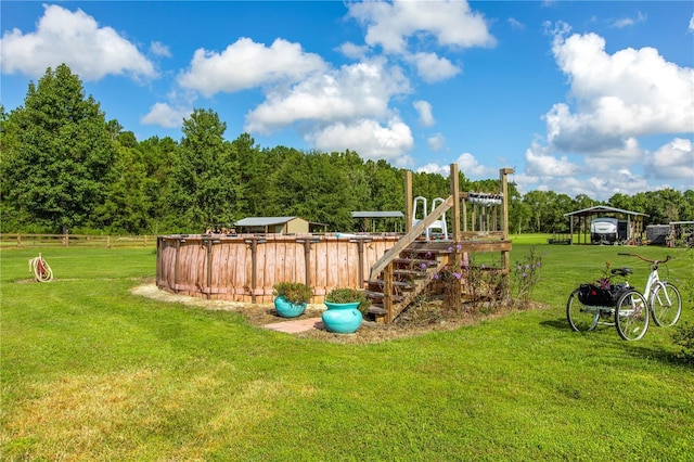 view of jungle gym featuring a lawn