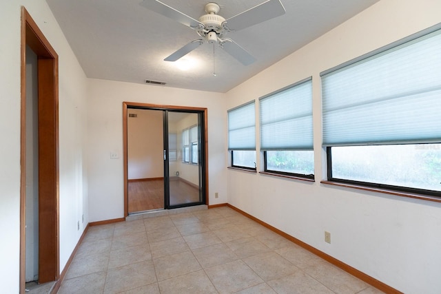 empty room with ceiling fan