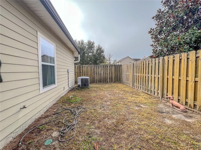 view of yard featuring central AC