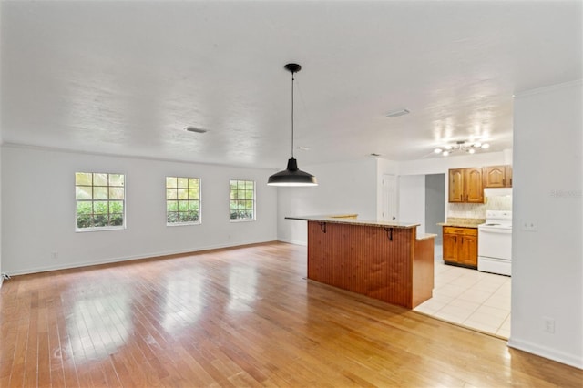 unfurnished living room with light hardwood / wood-style floors