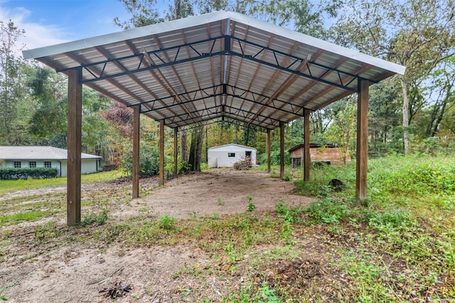 view of vehicle parking featuring a carport