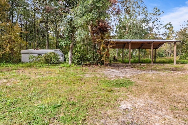 view of yard featuring a carport