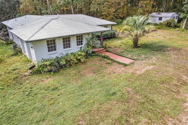 view of yard with covered porch