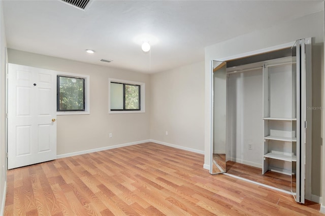 unfurnished bedroom with light hardwood / wood-style floors