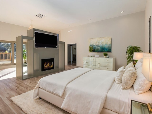 bedroom featuring light wood-type flooring