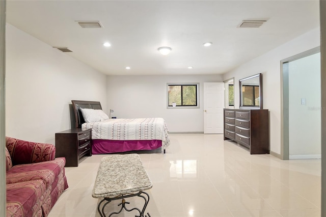 bedroom featuring light tile patterned floors