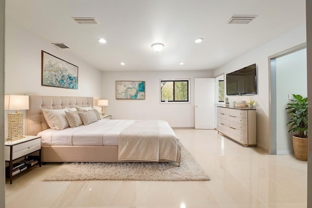 bedroom featuring light tile patterned floors