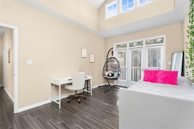 bedroom with dark wood-type flooring