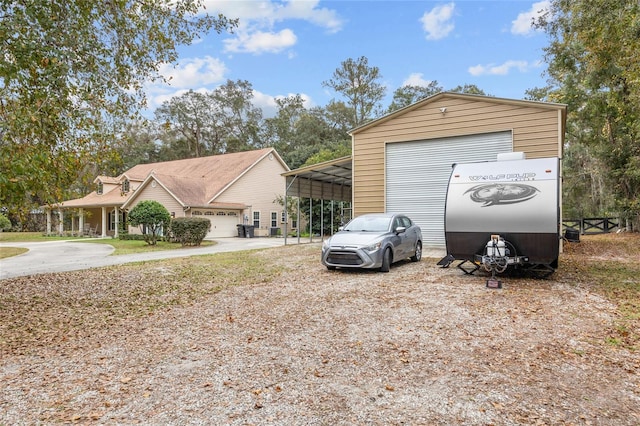 garage with a carport