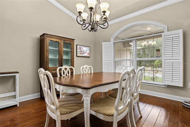 dining space with a chandelier, crown molding, and dark wood-type flooring