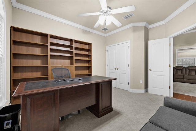 office area featuring ceiling fan, light colored carpet, and ornamental molding