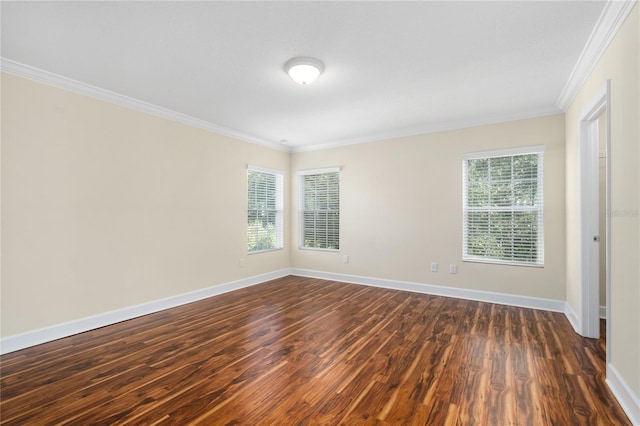 unfurnished room featuring dark wood-type flooring and ornamental molding