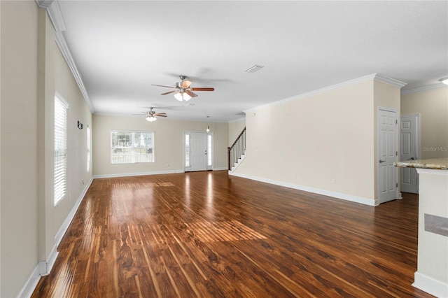 unfurnished living room featuring ornamental molding, ceiling fan, and dark wood-type flooring