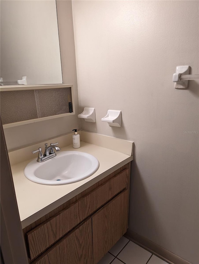 bathroom featuring tile patterned floors and vanity