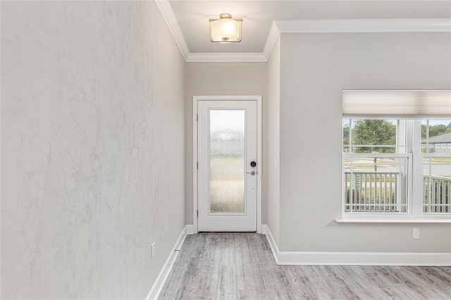 doorway featuring crown molding and light hardwood / wood-style floors