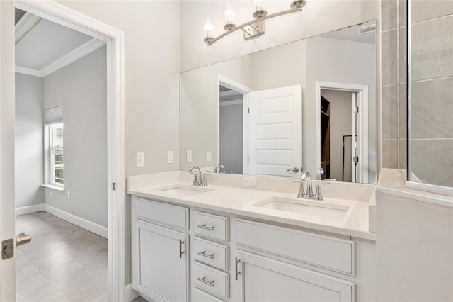 bathroom featuring vanity and ornamental molding