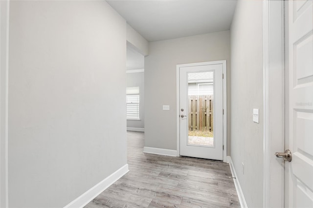 entryway with light hardwood / wood-style floors and a wealth of natural light