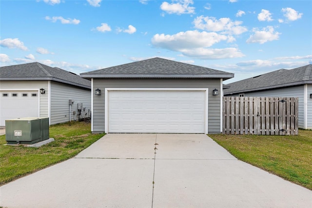 garage with a yard