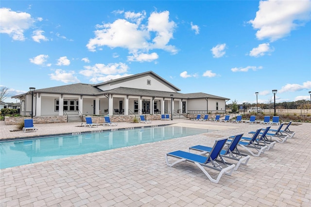 view of pool featuring a patio area