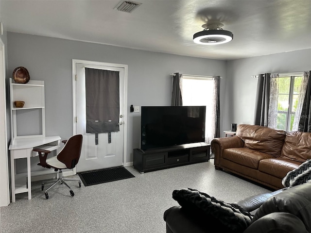 living room with a healthy amount of sunlight