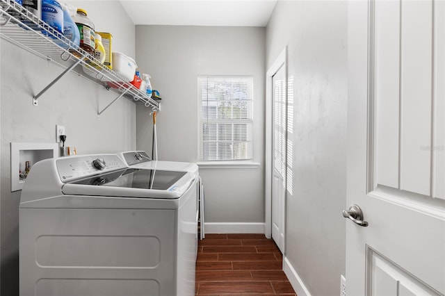 laundry area with washing machine and clothes dryer