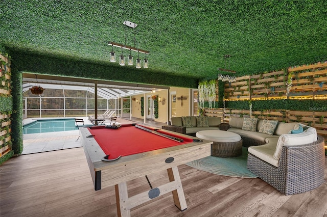 rec room with hardwood / wood-style flooring and billiards