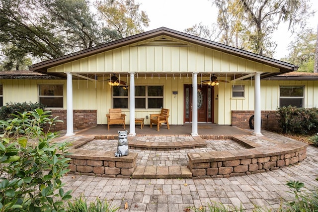 back of property featuring a porch