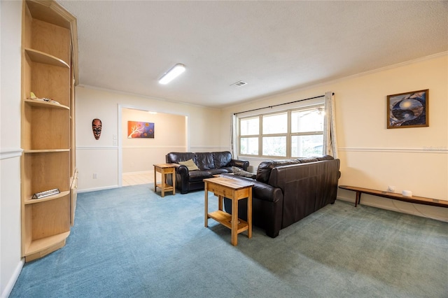 carpeted living room featuring ornamental molding