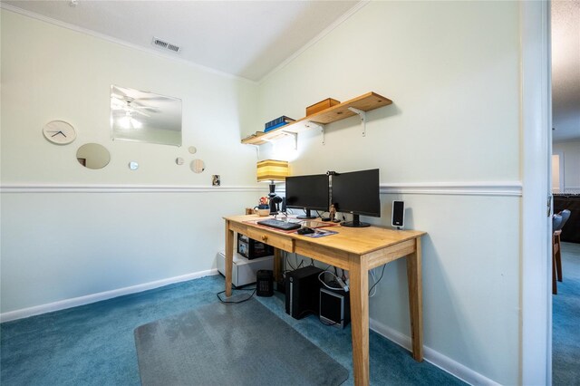 office space with ceiling fan, dark carpet, and ornamental molding