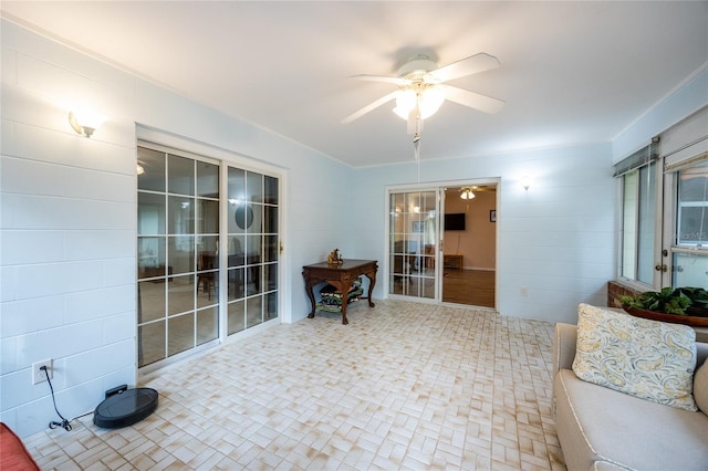 interior space featuring ceiling fan