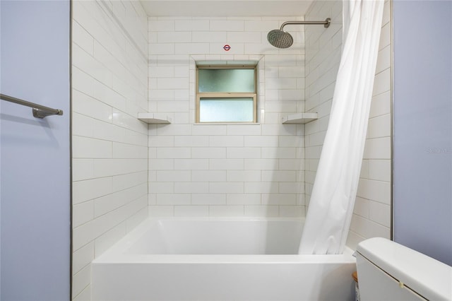 bathroom with shower / bath combination with curtain and toilet