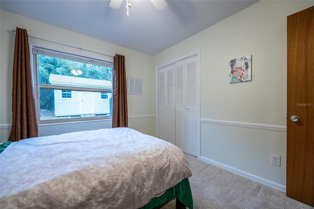 bedroom featuring carpet flooring, a closet, and ceiling fan