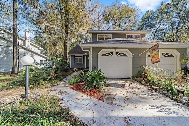 front of property with a garage