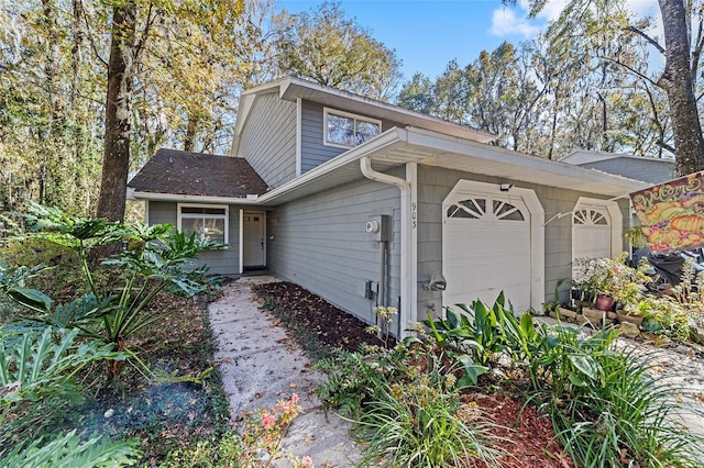 view of front of home with a garage