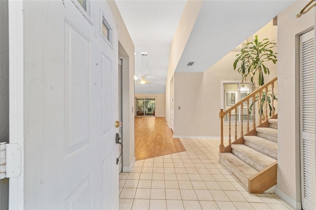 entryway featuring ceiling fan and light hardwood / wood-style floors