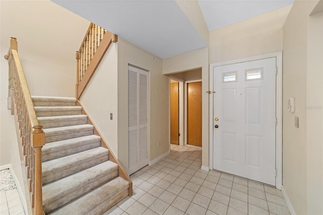 entryway featuring light tile patterned flooring