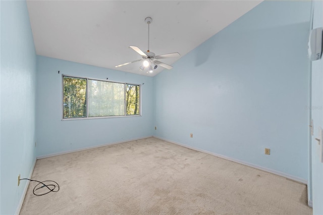 unfurnished room with light carpet, ceiling fan, and lofted ceiling