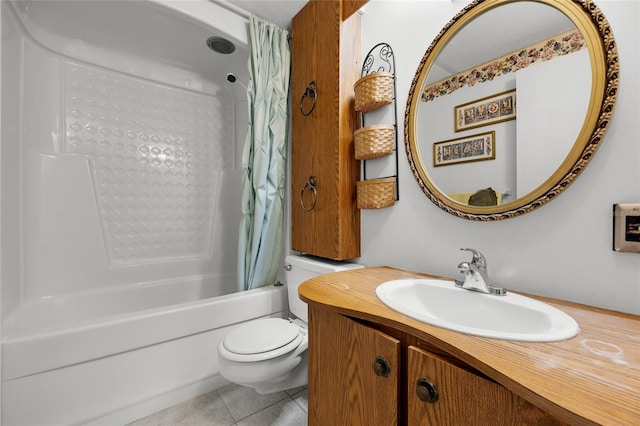 full bathroom featuring tile patterned flooring, shower / bath combination with curtain, vanity, and toilet