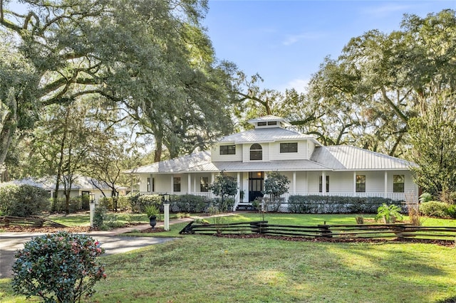 view of front of house with a front lawn