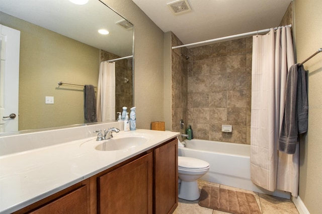 full bathroom with tile patterned floors, vanity, shower / bath combination with curtain, and toilet