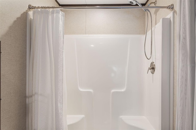 bathroom featuring walk in shower