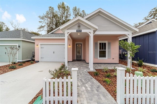 view of front of home with a garage