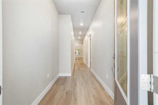 hall featuring light wood-type flooring